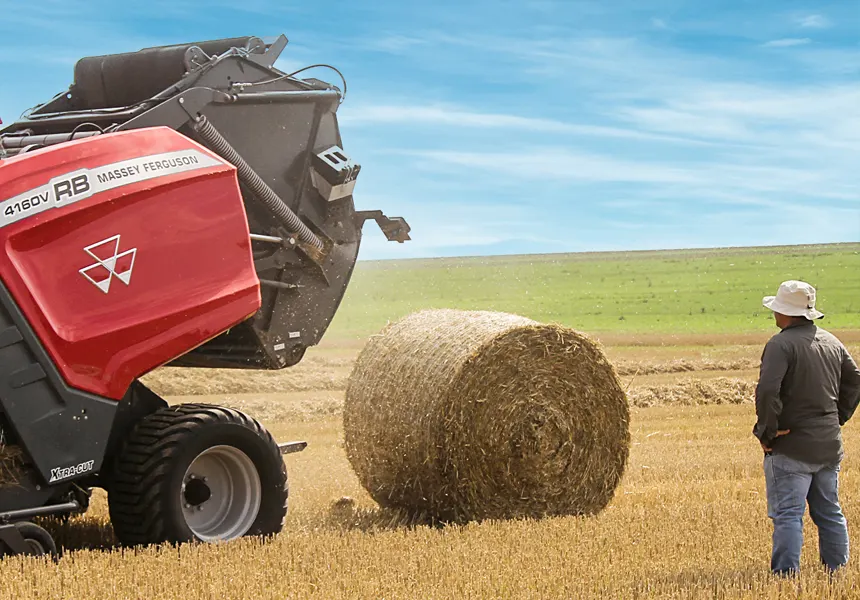 An EZ Web bale comes out of a Massey Ferguson baler